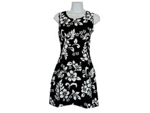 Load image into Gallery viewer, Black dress with white floral pattern on a mannequin against a white background