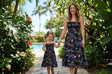 Load image into Gallery viewer, Woman and child in matching floral dresses walking together in a tropical garden.