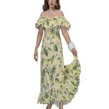 Load image into Gallery viewer, Woman wearing a handmade traditional Hawaiian muumuu dress in yellow with exclusive hibiscus floral print, featuring off-shoulder ruffled neckline, sweetheart front and back, and fishtail hem – made in Hawaii from 100% cotton.