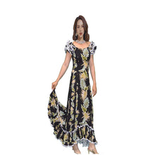 Load image into Gallery viewer, Woman wearing a handmade traditional muumuu dress in black with Hawaii leaf print, featuring an off-shoulder ruffled neckline, sweetheart front and back, and fishtail hem – a vintage cotton Hawaiian dress perfect for luau party outfits.
