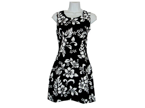 Black dress with white floral pattern on a mannequin against a white background