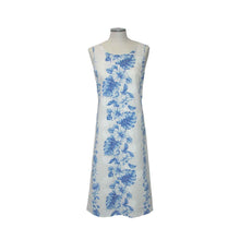 Load image into Gallery viewer, White dress with blue floral pattern on a mannequin against a white background
