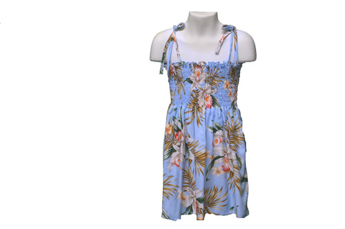 Floral dress on a mannequin against a white background