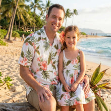 Load image into Gallery viewer, Father and daughter modeling matching tropical Hawaiian sets in exclusive Coral Hibiscus print, authentic island style family clothing by Ky's.

