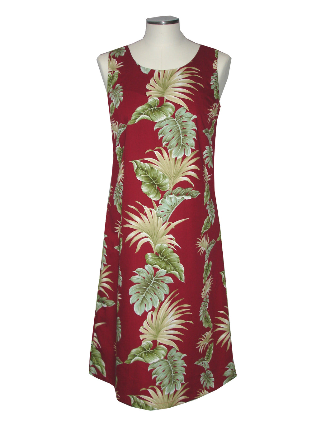 Red dress with tropical leaf pattern on a mannequin against a white background