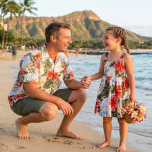 Load image into Gallery viewer, Father and daughter wearing matching Kahala Hibiscus tropical Hawaiian matching sets, featuring a men's Aloha shirt and a girls' Hawaiian dress handmade from 100% cotton poplin in Honolulu.

