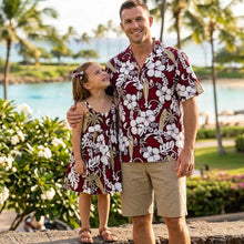 Load image into Gallery viewer, Father and daughter posing in matching Lei Hibiscus print Hawaiian shirt and girls dress, handmade in Honolulu by Ky's Made in Hawaii.
