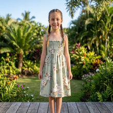 Load image into Gallery viewer, Young girl wearing the Lulumahu Orchid girls hawaiian dress, an authentic tube-style aloha outfit handmade in Honolulu.
