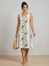 Load image into Gallery viewer, Woman wearing an Orchid Hibiscus Hawaiian dress for women, an A-line knee-length women's Aloha dress handmade in Hawaii.
