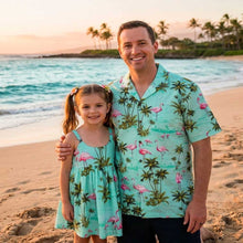 Load image into Gallery viewer, Father and daughter wearing matching Hawaiian vacation outfits in exclusive Pink Flamingo print, premium island style family clothing by Ky's.

