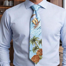 Load image into Gallery viewer, A light blue patterned necktie with a tropical island design featuring palm trees, a sailboat, and a thatched hut, worn with a light blue striped dress shirt.
