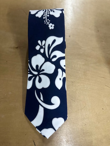 Navy Hawaiian tie with classic white hibiscus floral print – handcrafted in Hawaii