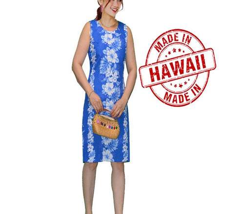 Woman wearing mini-length Hawaiian tank dress in Blue Hibiscus print, made of 100% cotton in Honolulu, Hawaii.